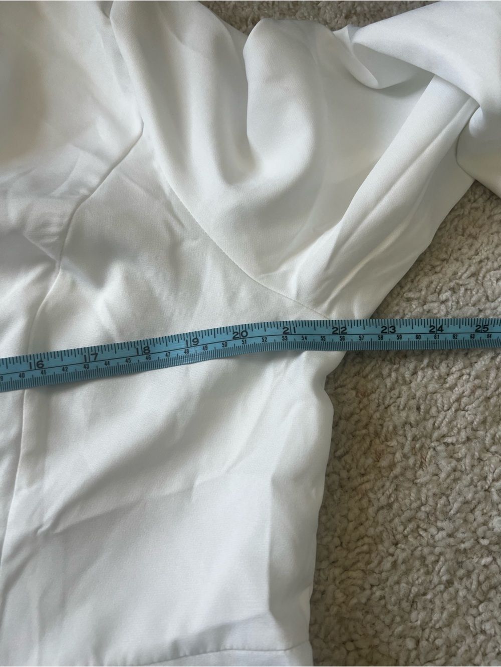 White Wrap-Front Long Sleeve Midi Dress doesn’t have size on it. Check pictures - Picture 8 of 8